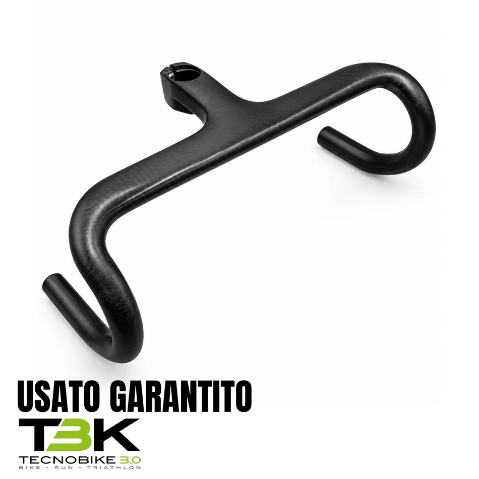 Cockpit integrato Megamo Carbon Road 2025 usato in ottime condizioni, manubrio e attacco manubrio in carbonio nero dal design aerodinamico per bici da corsa.
